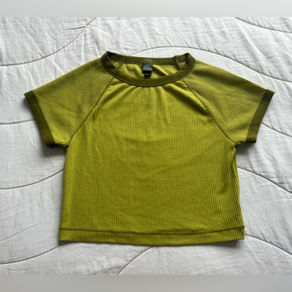 green baby tee